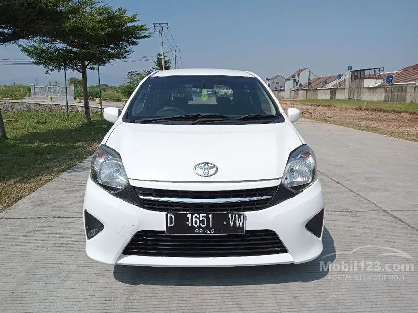 Jual Mobil Toyota Agya 2014 E 1.0 di Jawa Barat Manual Hatchback Putih Rp 79.000.000