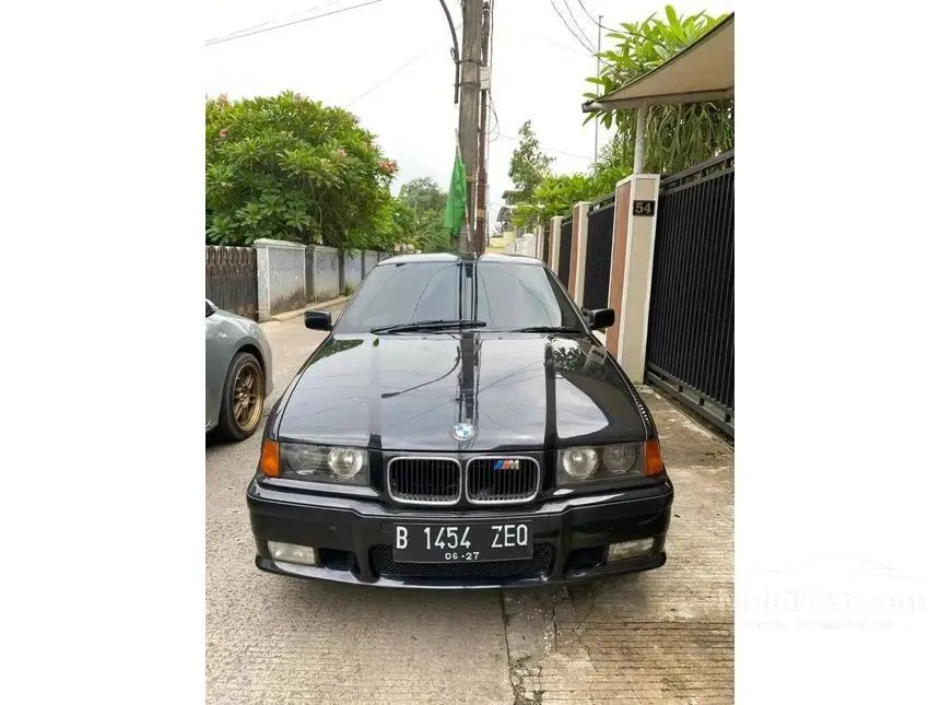 Jual Mobil BMW 320i 1995 E36 2.0 Automatic 2.0 di Jawa Barat Automatic Sedan Hitam Rp 65.000.000