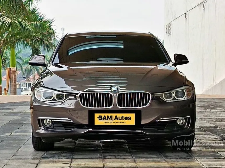 Jual Mobil BMW 320i 2014 Luxury 2.0 di DKI Jakarta Automatic Sedan Coklat Rp 275.000.000