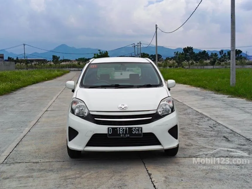 Jual Mobil Toyota Agya 2014 E 1.0 di Jawa Barat Manual Hatchback Putih Rp 75.000.000