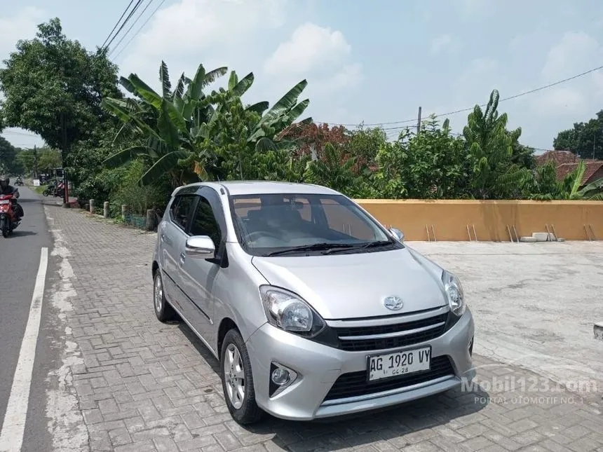 Jual Mobil Toyota Agya 2014 G 1.0 di Jawa Timur Manual Hatchback Silver Rp 95.000.000