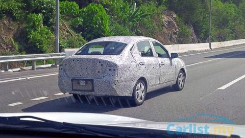 SPIED: 2016 Proton Saga, Draped In Camouflage Seen In Convoy Along NKVE. Next-Generation?