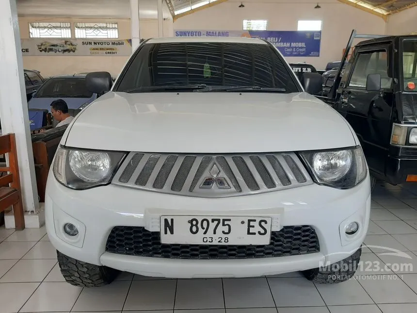 Jual Mobil Mitsubishi Strada Triton 2013 GLX Double Cab 2.8 di Jawa Timur Manual Pickup Putih Rp 155.000.000