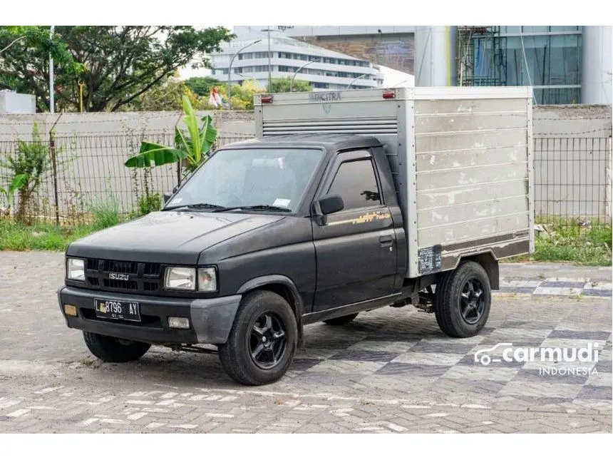 jual mobil isuzu pickup 2013 flat deck 2 5 di jawa timur manual pick up hitam rp 95 000 000 8712468 carmudi co id