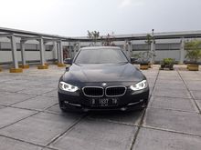 BMW 320i Sport 2.0 2013 AT Hitam Sedan