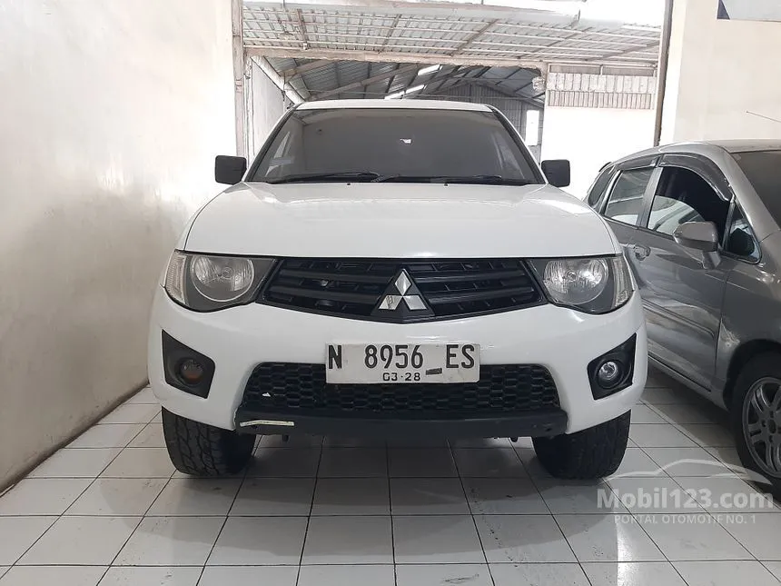 Jual Mobil Mitsubishi Strada Triton 2013 GLX Dual Cab 2.8 di Jawa Timur Manual Pick