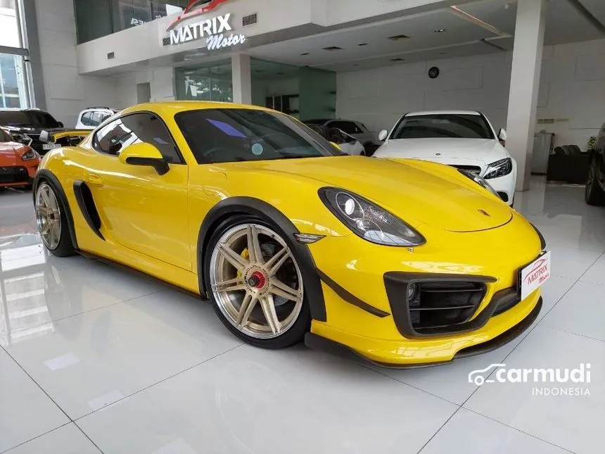Jual Mobil Porsche Cayman 2013 2.7 di DKI Jakarta Automatic Coupe Kuning Rp 1.450.000.000