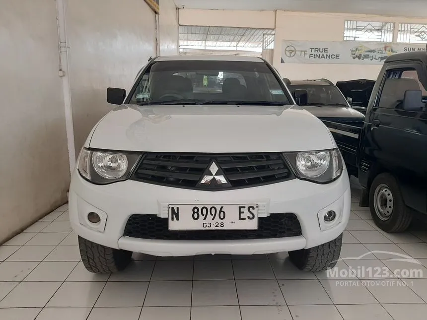 Jual Mobil Mitsubishi Strada Triton 2013 GLX Dual Cab 2.8 di Jawa Timur Manual Pick